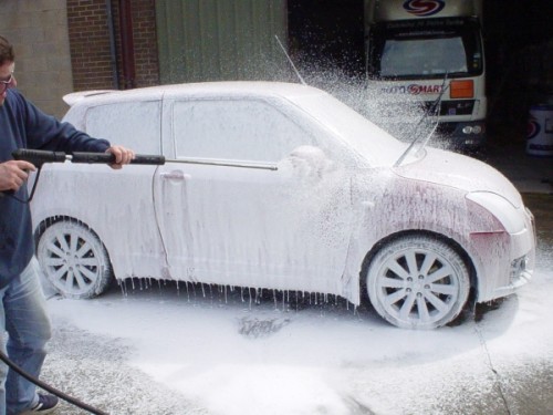 snow foam a car with a pressure washer